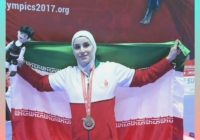 دختر طلایی مریوان پرچم ایران را برافراشت