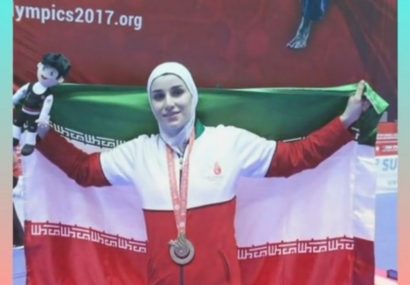 دختر طلایی مریوان پرچم ایران را برافراشت