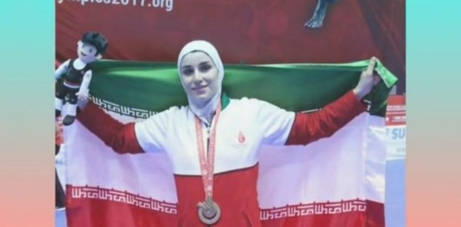 دختر طلایی مریوان پرچم ایران را برافراشت