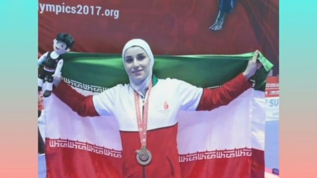 دختر طلایی مریوان پرچم ایران را برافراشت